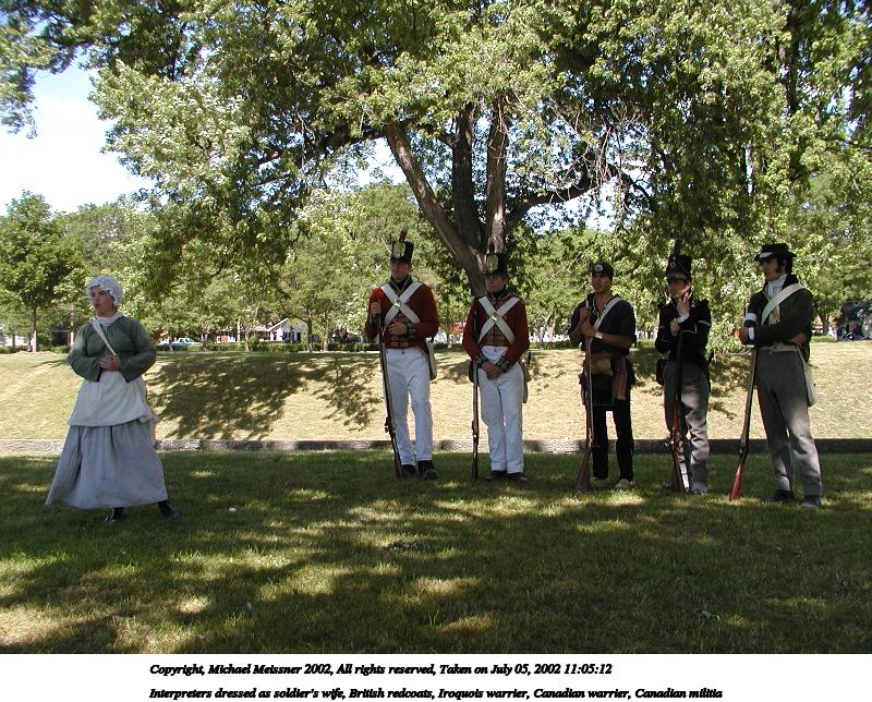 Interpreters dressed as soldier's wife, British redcoats, Iroquois warrier, Canadian warrier, Canadian militia