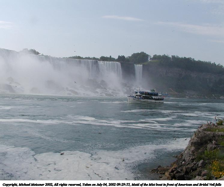 Maid of the Mist boat in front of American and Bridal Veil falls