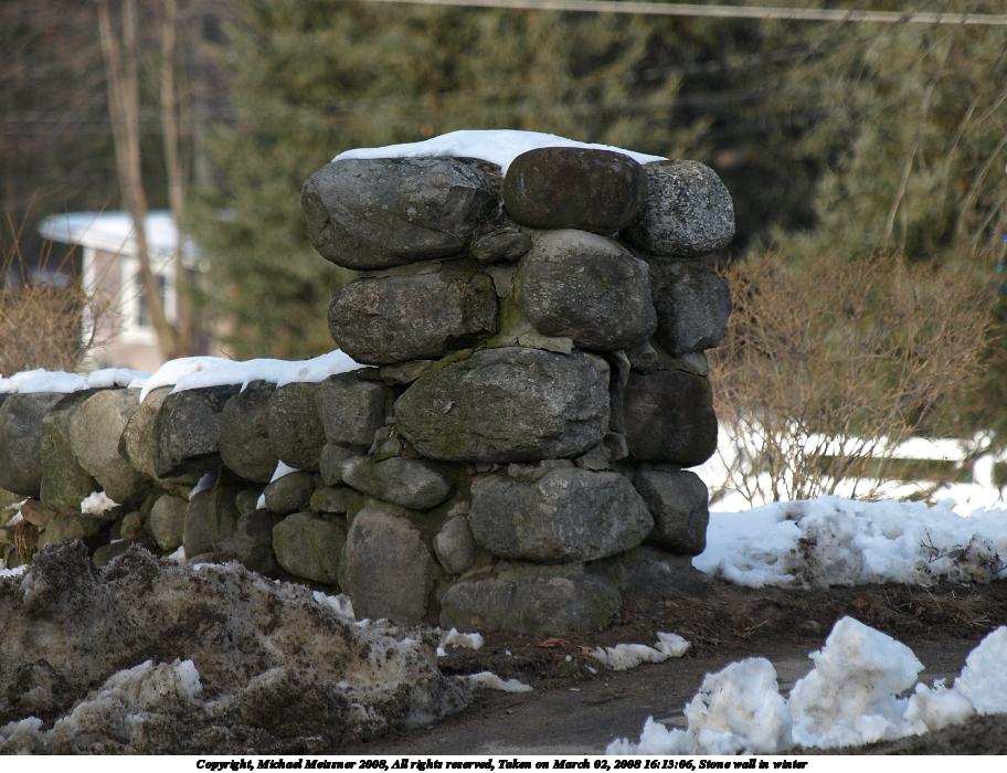 Stone wall in winter