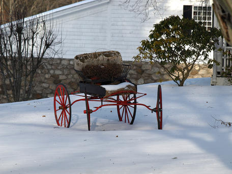 Old carriage in winter