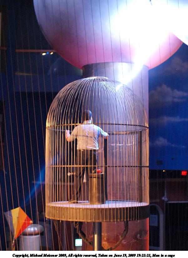 Man in a cage
