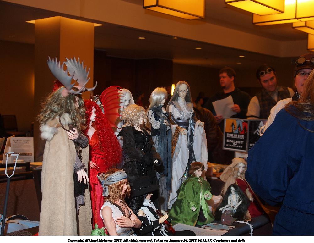 Cosplayers and dolls