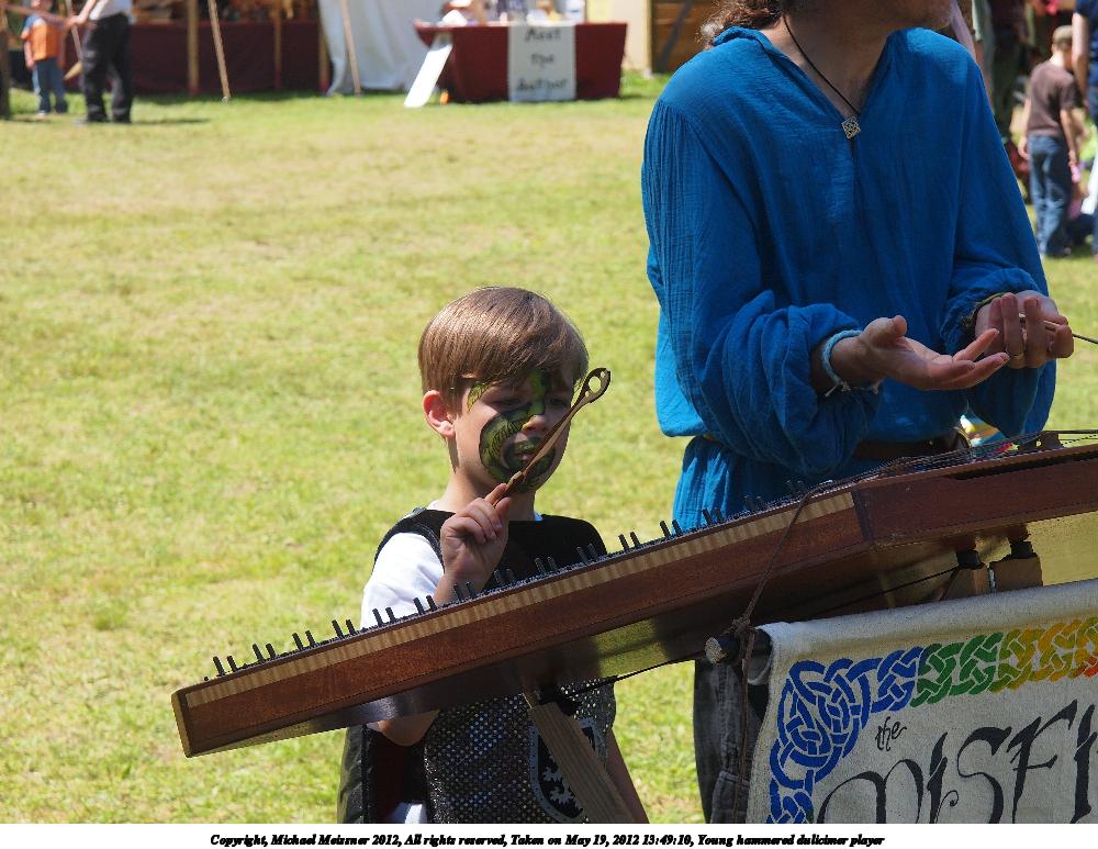 Young hammered dulicimer player