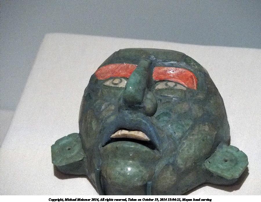 Mayan head carving