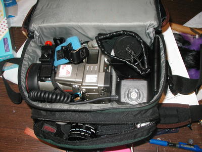 Packing the bag #2, camera in bracket, A-200 on top of flash, memory cards on side