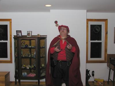 Mike juggling balls in ren. gear