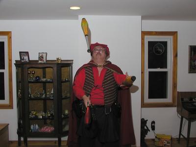 Mike juggling clubs in ren. gear #2