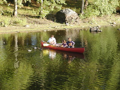 Canoe and ducks at the north bridge #2