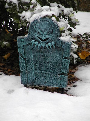 Halloween tombstone in snow
