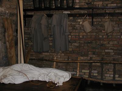 Cloaks and fire buckets in guardroom