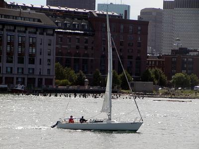 Sailboat in front of old pilings