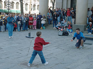 Practicing throwing juggling clubs