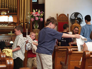 Passing out the tee shirts