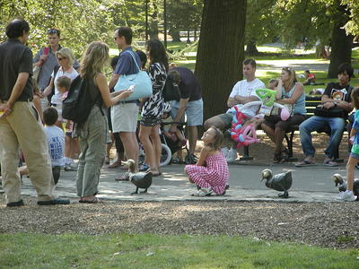Kids and the duck sculptures #2
