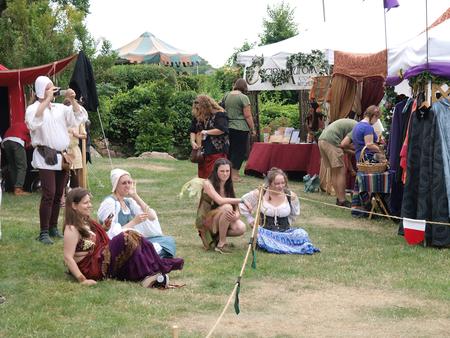 Crowd watching the Neville company