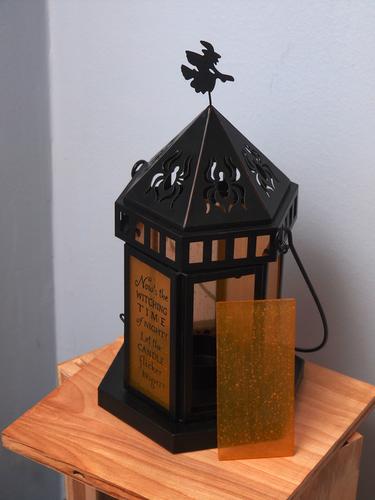 Lantern with one pane of glass removed