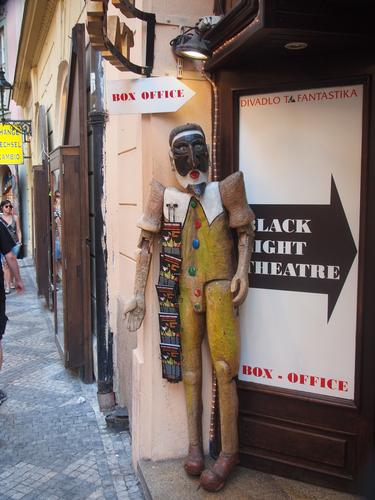 Wooden statue hawker