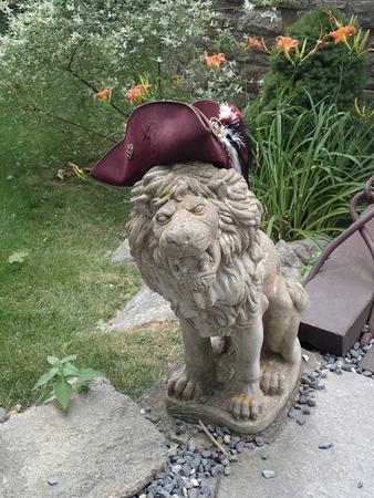 Lion at Hammond Castle with hat #2