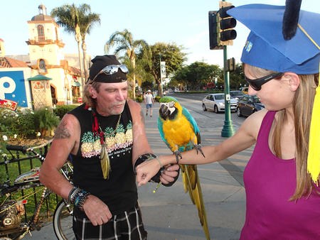 Capri with a macaw outside of Disneyland