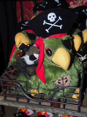 Racky whispering to a parrot