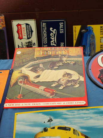 Cats and train advertisement