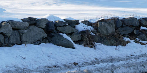 Stone wall in winter