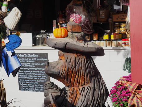 Carved bear and pumpkin