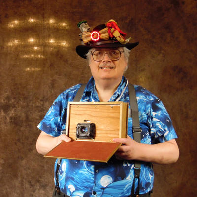 Arisia photo booth picture of me with my book camera