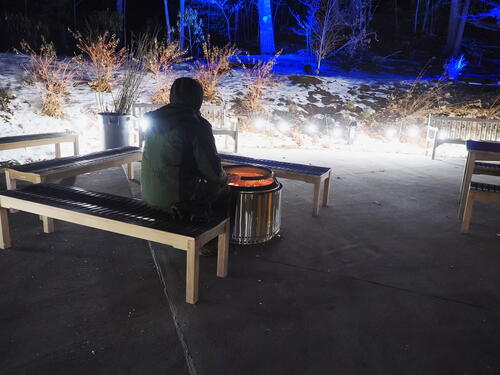 Warming up at the fire pit