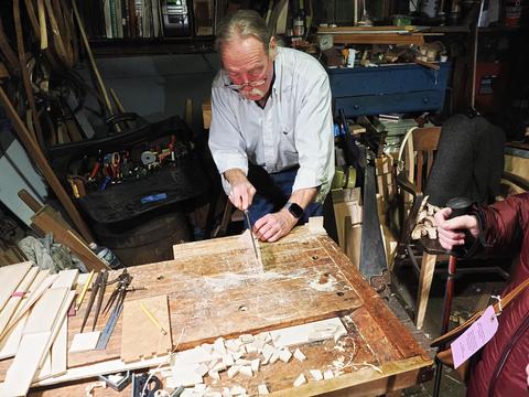 Woodcarver at Strawbery Banke
