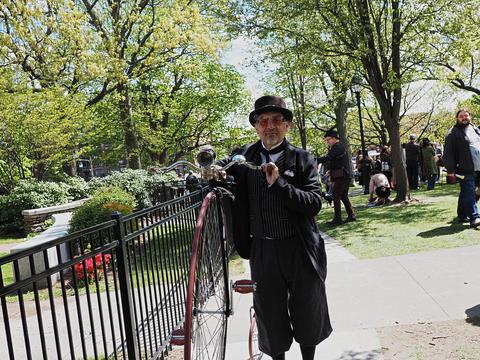 Steampunk with penny farthing bike