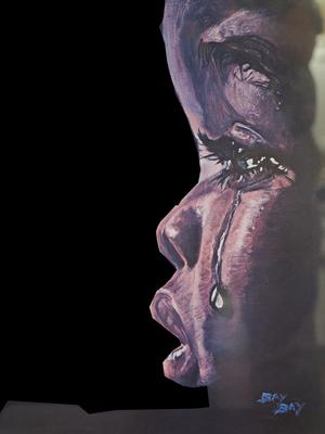 Crying child painting