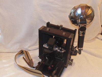 OM-3, 17mm f/1.2 lens, and Godox Lux Master flash